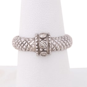 DIAMOND RING SET IN ROPE PATTERNED 14K WG