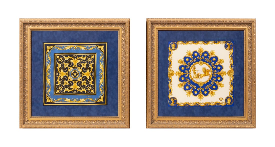 TWO FRAMED VERSACE BAROQUE SILK SCARVES: Versace (Italian, founded 1978), late 20th to early 20th century. Group of two framed Baroque silk handkerchiefs / scarves, one in black, blue and yellow with Medusa head, and one in blue, cream, and