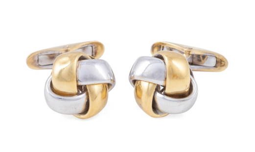 TWO TONE 18K GOLD KNOT CUFFLINKS: Italian. Knot cufflinks in 18k yellow and white gold. Marked "18k Italy". Provenance: Private Collection, Alpharetta, GA. Approx dimensions: dia. 0.5", d. 0.75"; total weight 10.6 grams. Note: Credit