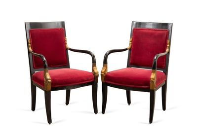 PR. OF EMPIRE STYLE EBONIZED PARCEL GILT ARMCHAIRS