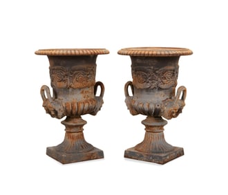 PAIR OF NEOCLASSICAL STYLE CAST IRON URNS