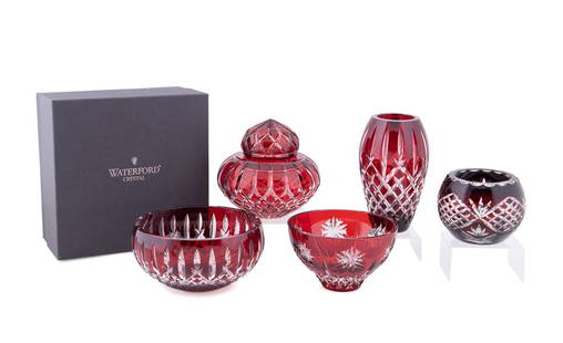 5 PIECES OF RUBY TABLEWARE INCLUDING WATERFORD: Assortment of five pieces of ruby cased cut to clear crystal table articles comprising, a Waterford Crystal "Araglin Prestige" bowl (in box) and vase, and a "Snow Crystals" bowl, together with a likel