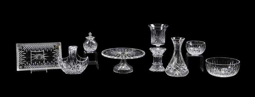 9 PIECES OF WATERFORD CRYSTAL 'LISMORE' TABLEWARE: Waterford Crystal (Irish, founded 1783). Assortment of nine pieces of "Lismore" (pattern introduced 1952) colorless crystal tableware comprising, a cake plate, two bowls, a honey pot, a tray, a carafe