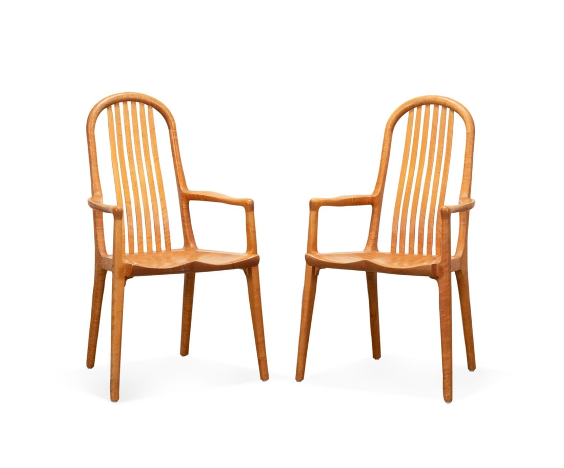PAIR OF ROBERT ERICKSON BIRDSEYE MAPLE ARMCHAIRS: Robert Erickson (American, born 1947), 1991. Pair of studio benchmade birdseye maple armchairs, each having a curved crest rail, vertical splats, saddle seat, and rising on tapering legs, marked to th