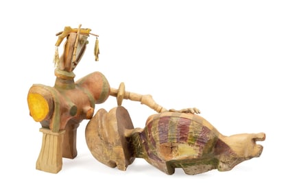 KIMO MINTON, CARVED COTTONWOOD RECLINING FIGURE