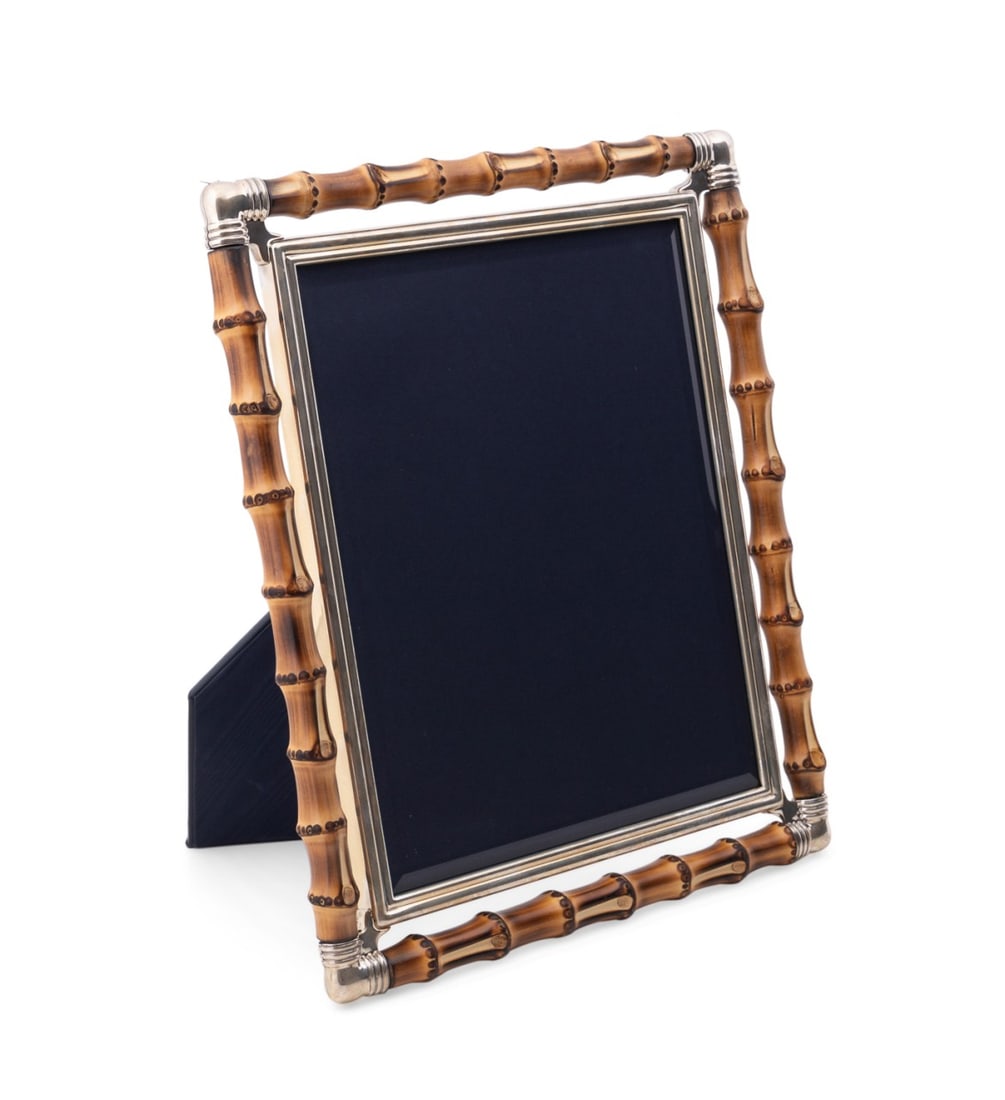 BUCCELLATI STERLING SILVER AND BAMBOO 8 X 10 FRAME: Buccellati (Italian, founded 1919), late 20th century. Sterling silver and natural bamboo 8" by 10" photograph frame, marked appropriately, in box. Provenance: Private Collection, Suwanee, GA. Note: C