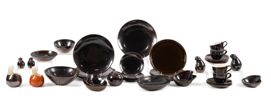 38 PIECES OF EVA ZEISEL FOR RED WING DINNERWARE: Eva Striker Zeisel (Hungarian / American, 1906-2011) for Red Wing Pottery (American, founded 1861). Group of 38 pieces of mainly "Town and Country" Brown Metallic (pattern active 1946-1954) dinnerware