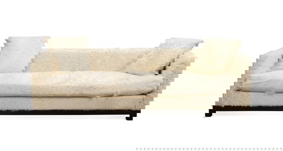 CREAM COWHIDE MCM SOFA, MANNER OF PEARSALL: Style of Adrian Pearsall (American, 1925-2011), circa 1970. Mid Century Modern cream cow hide sofa, having a single seat cushion, two accent pillows, and raised on square legs, apparently unmarked. 