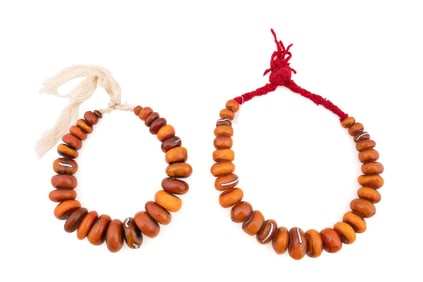 TWO COPAL AMBER BEADED STRANDS WITH SILVER INLAY