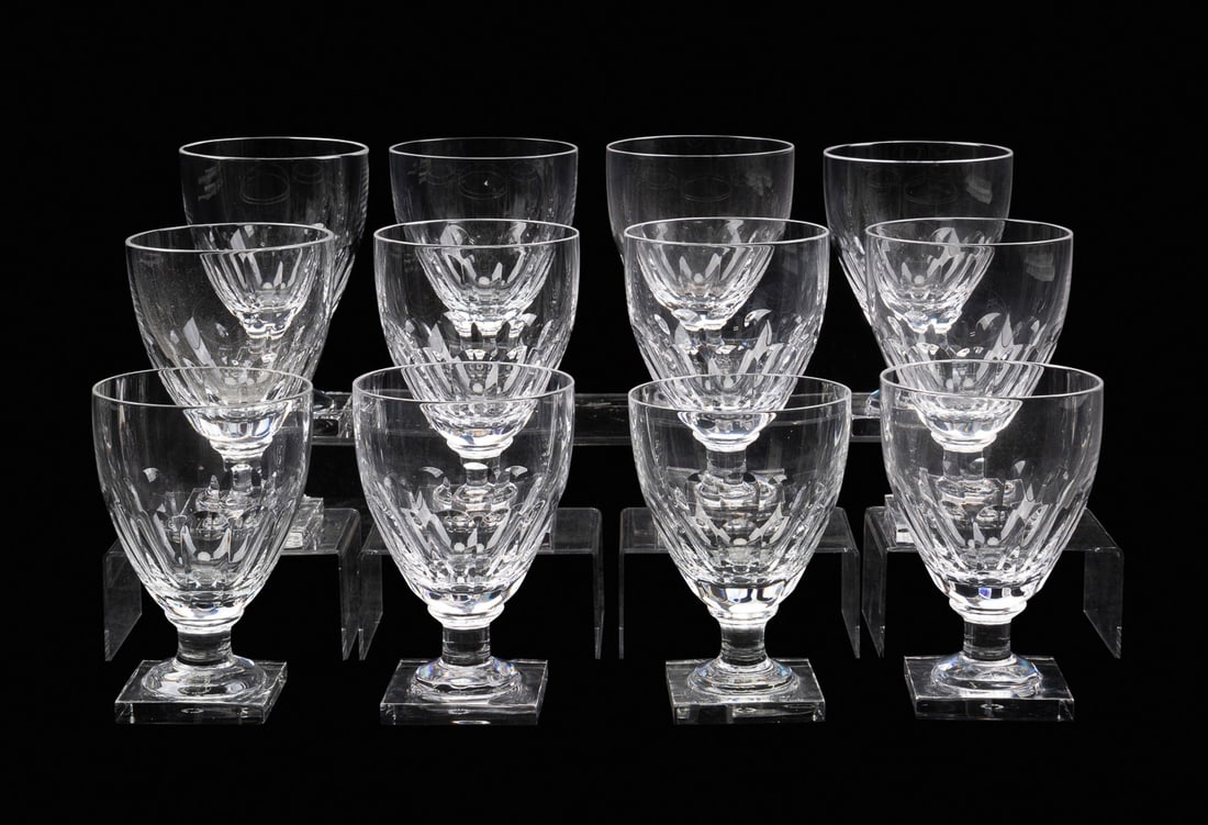 WILLIAM YEOWARD, 12 PIECES OF 'CAROLINE' STEMWARE: William Yeoward (English, founded 1995). Set of 12 pieces of crystal "Caroline" stemware comprising 11 water goblets and 1 claret wine glasses, each rising on a square foot, all marked appropriately t