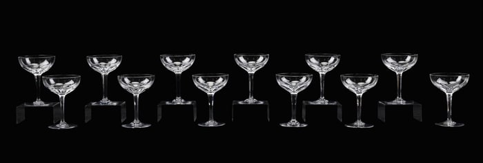 BACCARAT, SET OF 12 'GENOVA' CHAMPAGNE COUPES