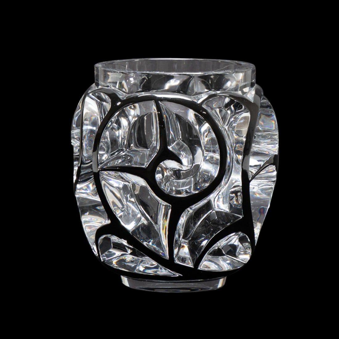 LALIQUE 'TOURBILLONS' BLACK ENAMEL ACCENTED VASE: Lalique (French, founded 1888), contemporary. Numbered edition colorless "Tourbillons" crystal vase having black enamel accents, model number 973, after the original issued in 1926, signed appropriate