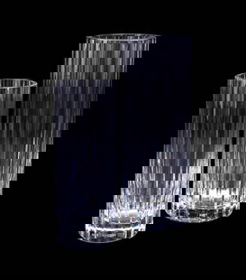 BACCARAT, TWO COLORLESS 'HARMONIE' CRYSTAL VASES: Baccarat (French, founded 1764), contemporary. Set of two "Harmonie" (pattern introduced 1974) colorless crystal vases, both appropriately marked. Provenance: Private Collection of an Esteemed Gentlem
