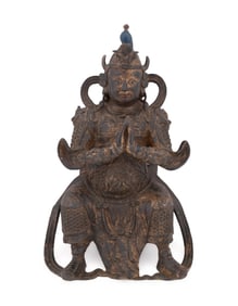 CHINESE BRONZE SEATED BUDDHIST GUARDIAN