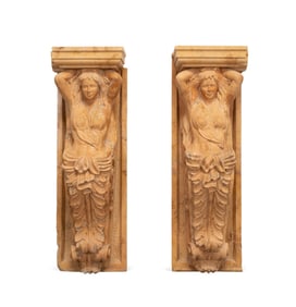 PAIR OF PINK MARBLE CARYATID-FORM CORBELS