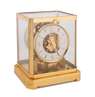 JEAGER-LECOULTURE ATMOS MANTLE OR SHELF CLOCK: Jaeger-Lecoultre (Swiss, founded 1833). Atmos perpetual motion mantle or shelf Clock, caliber 528-8, 15 Jewel movement, serial #372926. Marked to the bottom. Approximate dimensions: h. 9.25", w. 8.25"