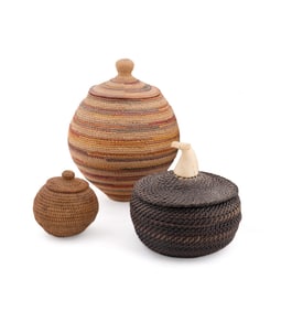 THREE ALASKAN LIDDED BASKETS, INCLUDING JOHN LONG