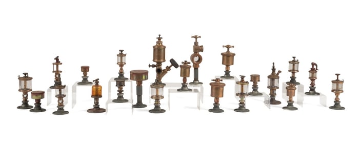 22 VINTAGE ENGINE OILERS BRASS AND GLASS ON STANDS