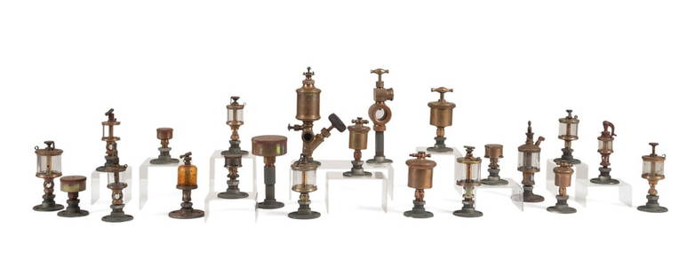 22 VINTAGE ENGINE OILERS BRASS AND GLASS ON STANDS: American, 20th century. Group of 22 brass engine oilers, many with glass reservoirs, mounted on metal display stands, most marked "Lunkenheimer Co.," with one marked "Viking." Private Collection of Ja