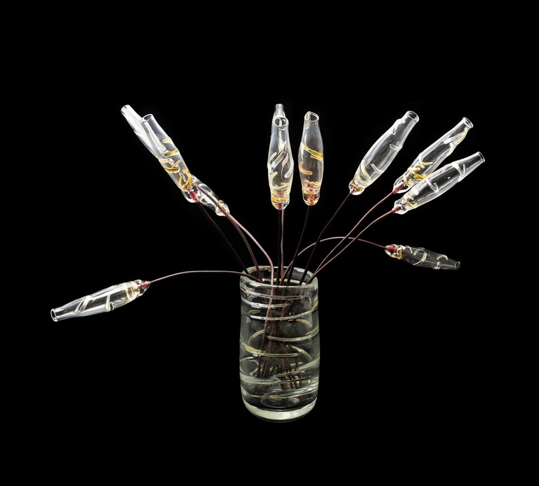 GIORGIO VIGNA FOR VENINI GLASS VASE & 11 FLOWERS: Giorgio Vigna (Italian, 1955) for Venini (Italian, founded 1921), 2002. Blown Murano colorless glass vase, having silver metal accents, with 11 colorless glass flowers with copper stems, the vase appr