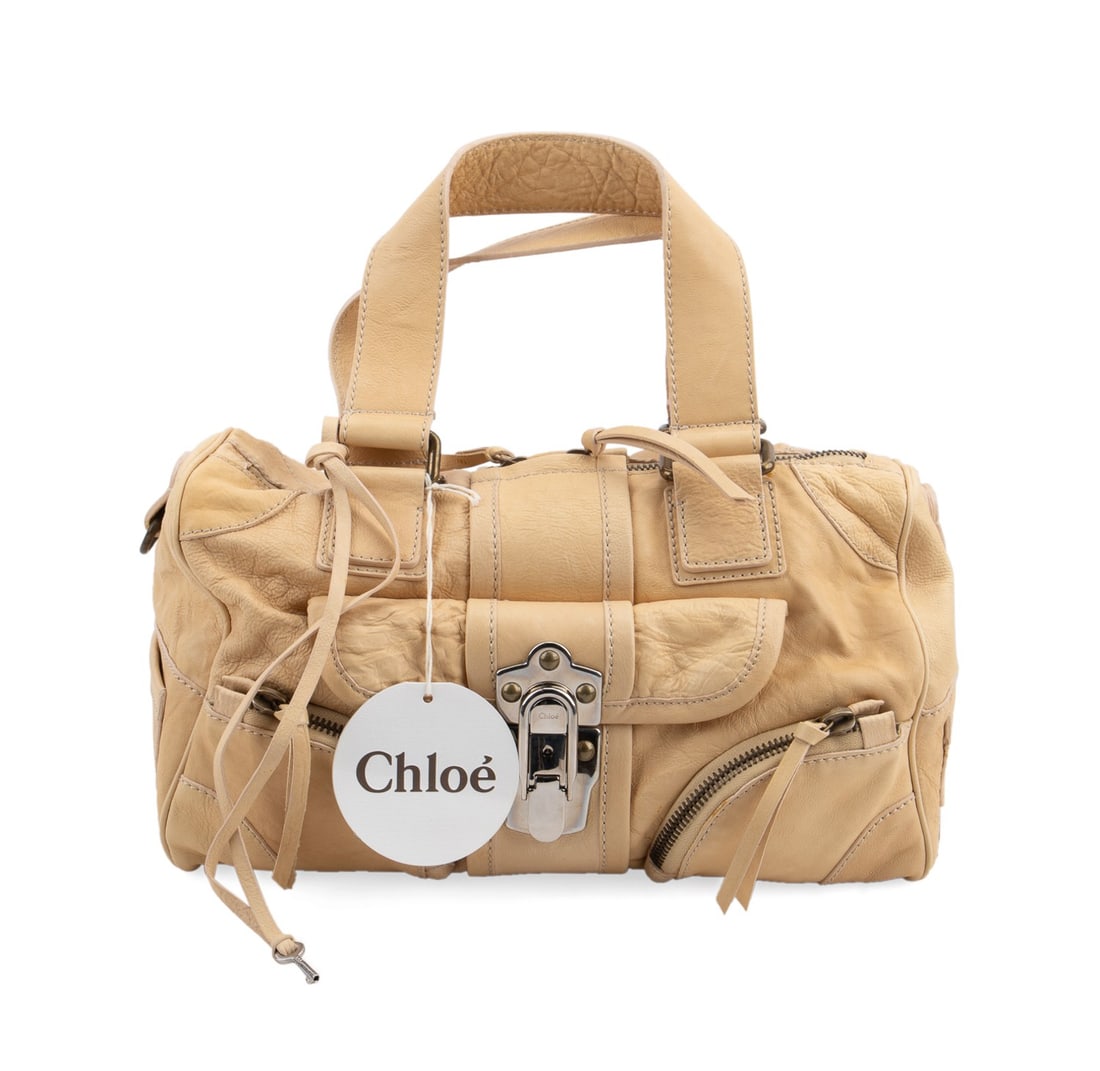 CHLOE 2006 SABLE COLOR LEATHER HANDBAG: Chloe (French, founded 1952), 2006. Sable goat skin leather shoulder bag, having silver tone hardware, four small exterior zippered pockets, and a key. Stamped maker's mark and date code to interior.