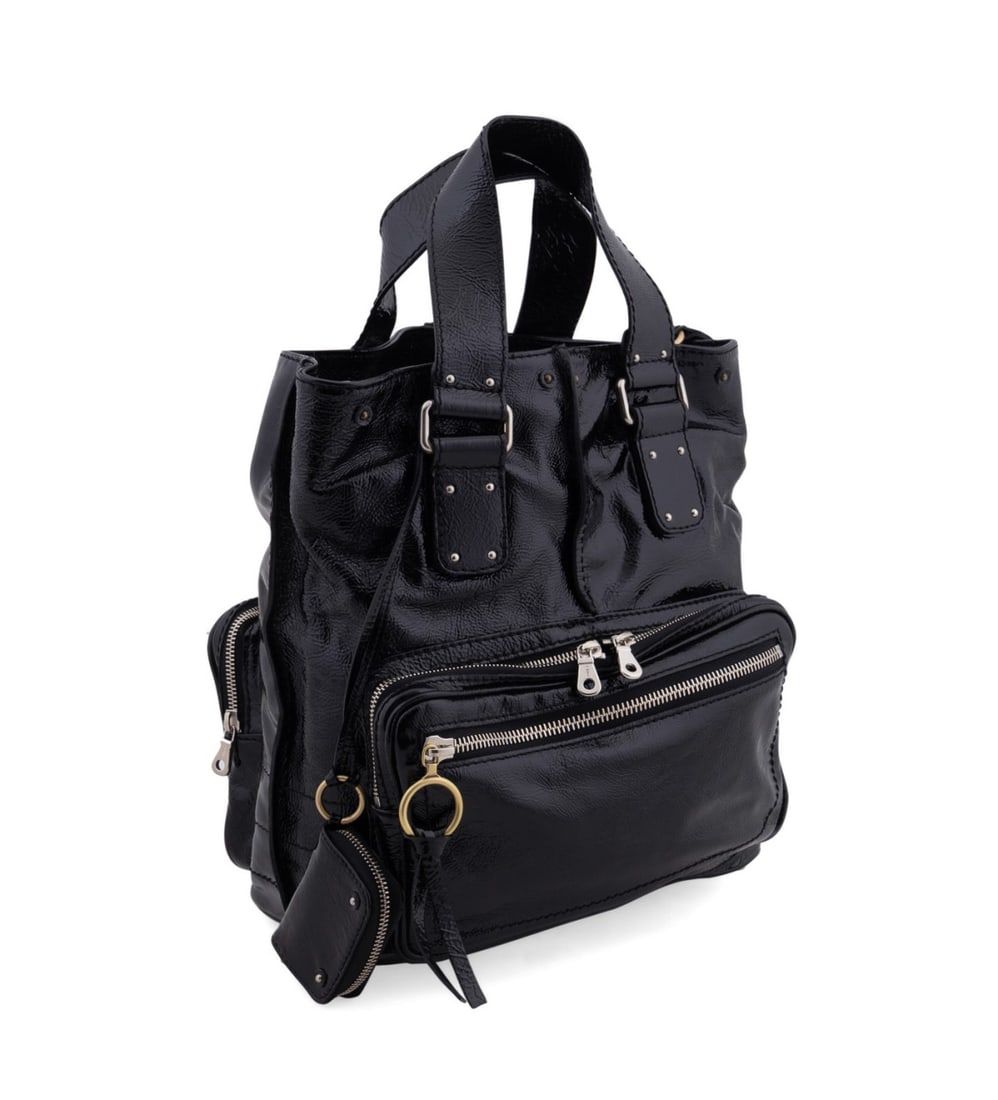 CHLOE BLACK PATENT LEATHER BETTY TOTE: Chloe (French, founded 1952). Black patent leather Betty tote with numerous pockets, and mixed gold and silver toned hardware. Accompanied by removable coin purse on strap, dust bag, and original tags