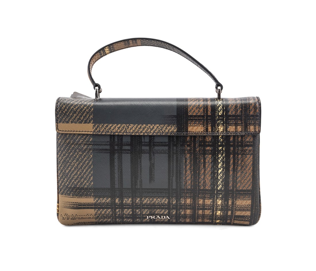 PRADA SAFFIANO LEATHER TARTAN PLAID TOP HANDLE BAG: Prada (Italian, founded 1913). Saffiano leather top handle bag in a multicolor tartan plaid print with silver tone hardware, front flap opens to three spacious interior compartments with smaller pocke