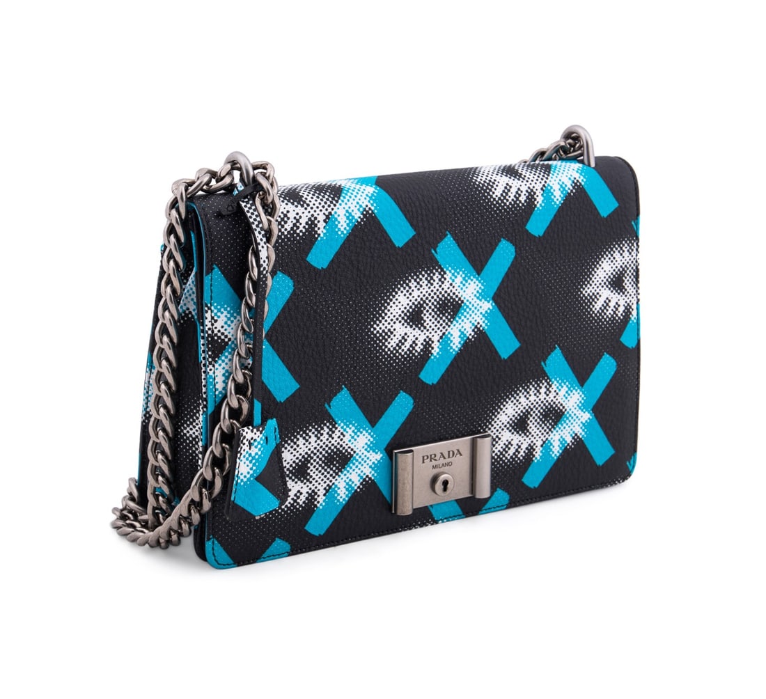 PRADA VITELLO DAINO EYE PRINT FLAP BAG W/ CHAIN: Prada (Italian, founded 1913), Resort 2016 Collection. Eye print flap bag in blue, black, and white, constructed of Vitello Daino leather with silver-tone hardware, adjustable chain strap, multiple in