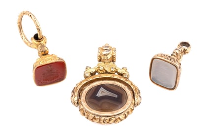 THREE PLATED GOLD, AGATE & CRYSTAL WATCH FOBS
