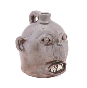 BROWN BROS. (ARDEN, NC) BROWN GLAZED FACE JUG