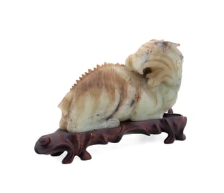 CHINESE JADE 'SON OF DRAGON' ON WOOD STAND