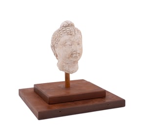 SMALL GANDHARAN BUDDHA HEAD ON STAND