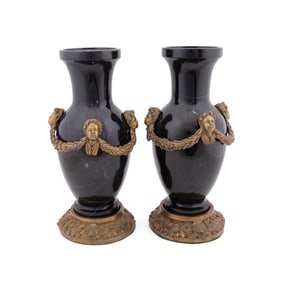 PAIR OF BRONZE MOUNTED BLACK PORTORO MARBLE URNS