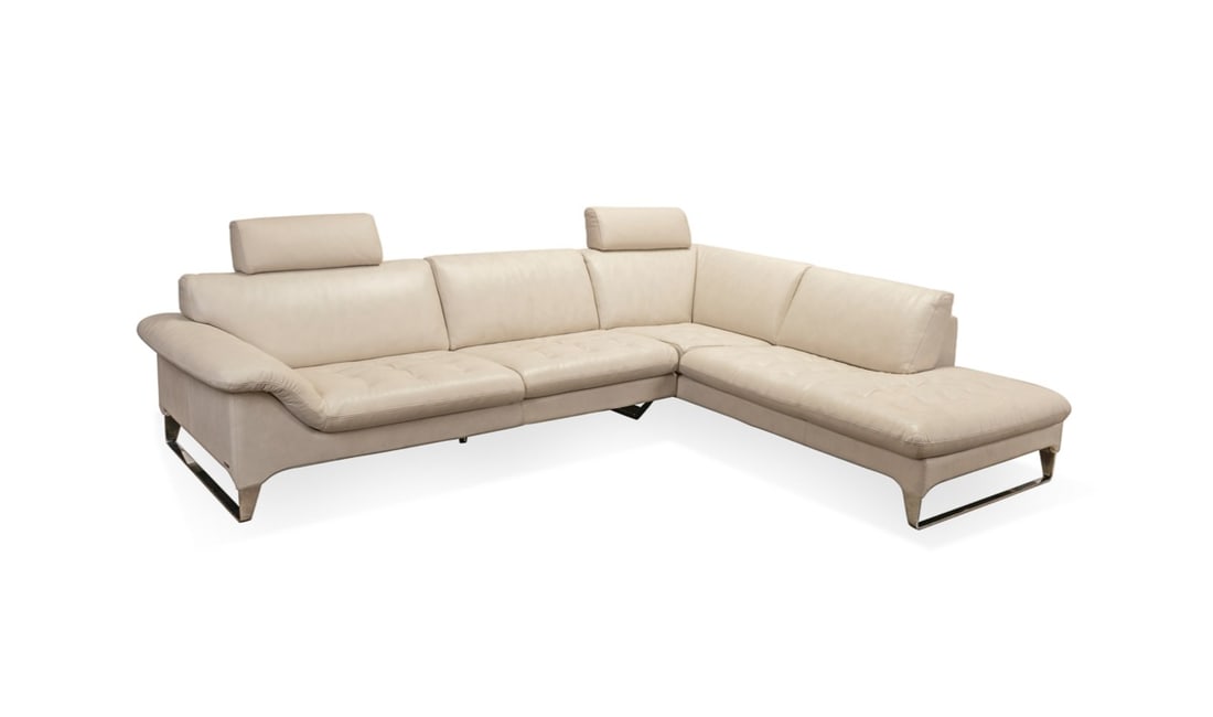 ROCHE BOBOIS WHITE LEATHER "L"SECTIONAL SOFA: Roche Bobois (French, founded 1960). White pebbled grain leather sectional sofa in an "L" form, with two movable head rests and chromed steal legs, having several maker's marks. Provenance: Private Co