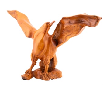 LARGE CARVED SCULPTURE OF AN EAGLE