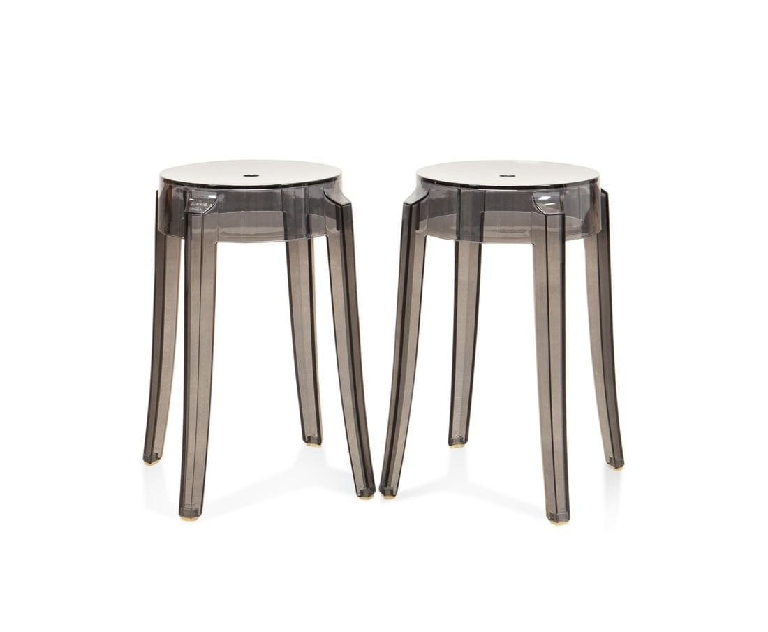 STARCK FOR KARTELL, PAIR OF 'CHARLES GHOST' STOOLS: Philippe Starck (French, born 1949) for Kartell (Italian, founded 1949), contemporary. Pair of "Charles Ghost" smoke grey polycarbonate stools, appropriately marked. Approximate dimensions: h. 18.25",