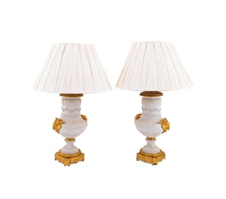 PAIR OF ATTR. SEVRES BISQUE URNS MOUNTED AS LAMPS