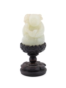 CHINESE CARVED JADE FIGURINE ON STAND