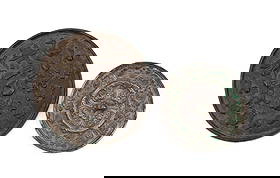 TWO CHINESE ANTIQUE TANG STYLE BRONZE MIRRORS: Chinese. Group of two antique Tang style bronze mirror, the largest depicting a hunt scene and the smallest having a lion and grape vine design, both with paper labels but otherwise apparently unmarke