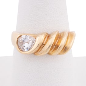 0.62CT PEAR DIAMOND RIBBED 14K YELLOW GOLD RING
