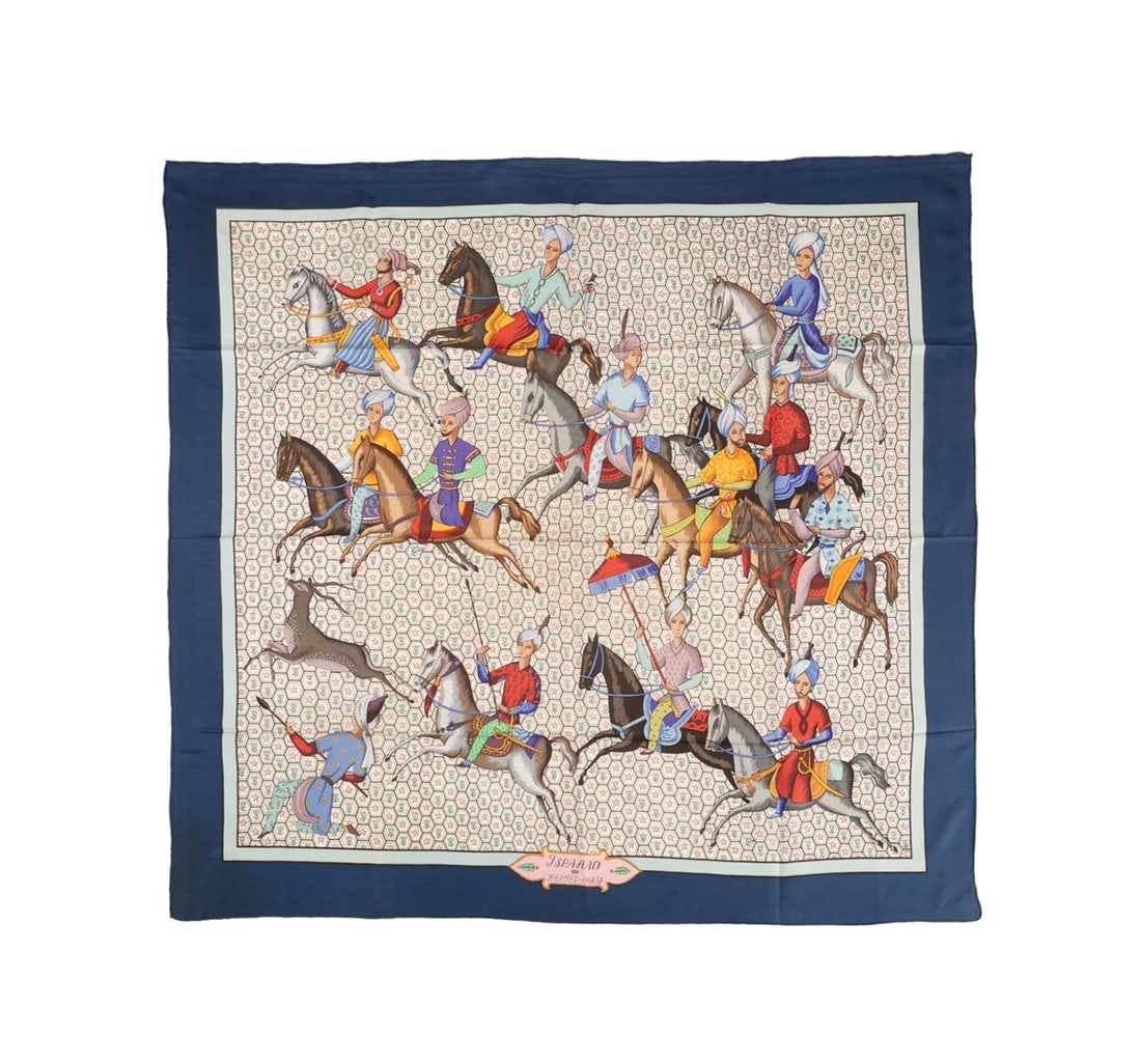 HERMES 'ISPAHAN' SCARF, 1967: Maurice Tranchant for Hermes (French, founded 1837), 1967. Silk "Ispahan" scarf in blue depicting several Iranian gentlemen riding horses dressed in colorful tack, with original silk label. Marked app