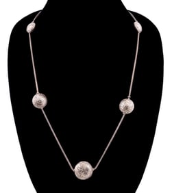 TWO FRENCH GRADUATING COIN SILVER NECKLACES