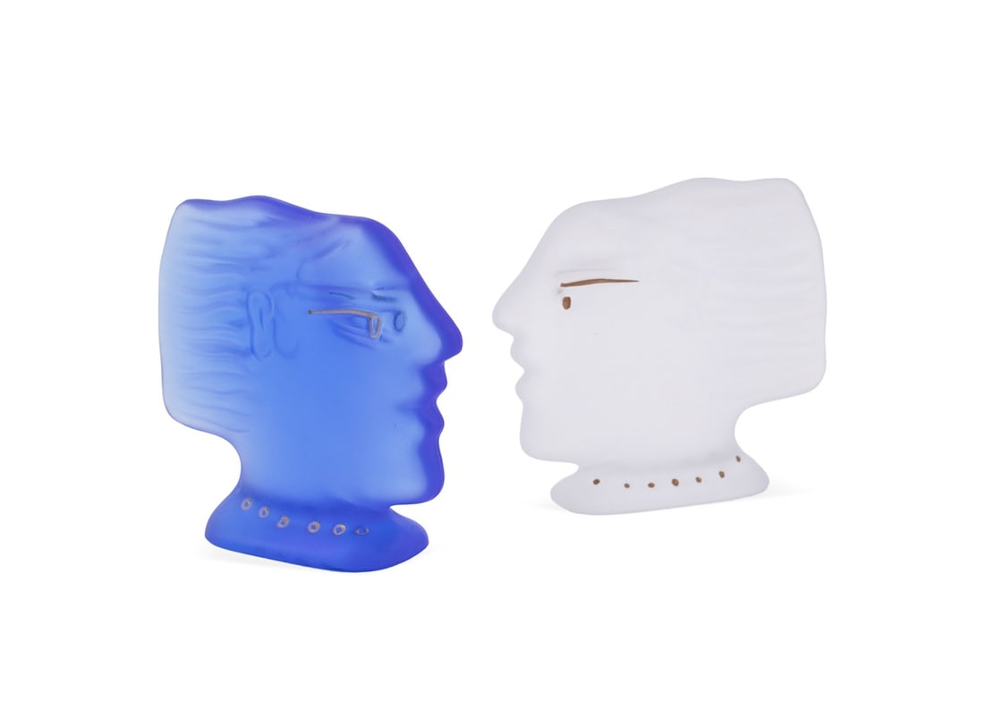 A. FASSIANOS FOR DAUM, PAIR OF 'KALLISTI' FIGURES: Alekos Fassianos (Greek, 1935-2022) for Daum (French, founded 1878), after 1988. Pair of pate de verre "Kallisti" glass figures, in colorless and blue, both appropriately marked. Approximate measureme