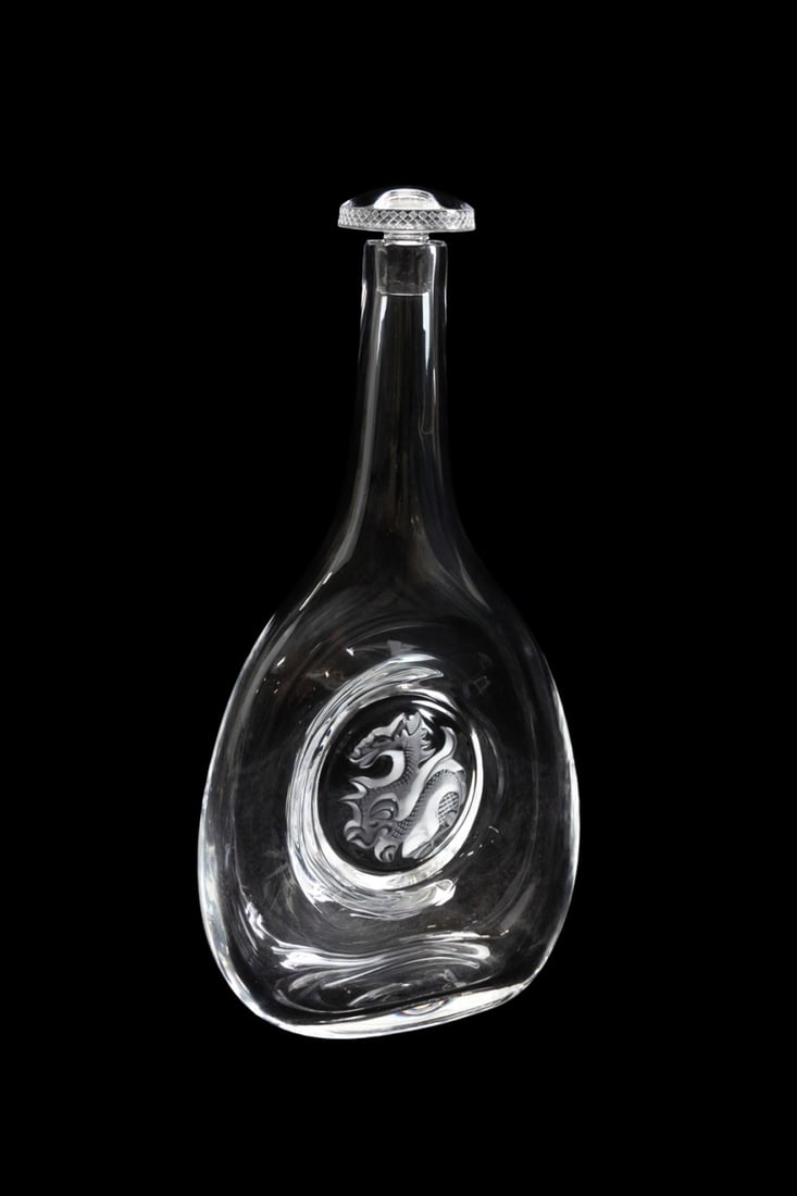 LALIQUE 'CHIMERE DRAGON' CRYSTAL DECANTER: Lalique (French, founded 1888), early 21st century. Colorless crystal "Chimere Dragon" decanter with frosted accents, appropriately marked with number "103". Approximate measurements: h. 12.75", w. 6.