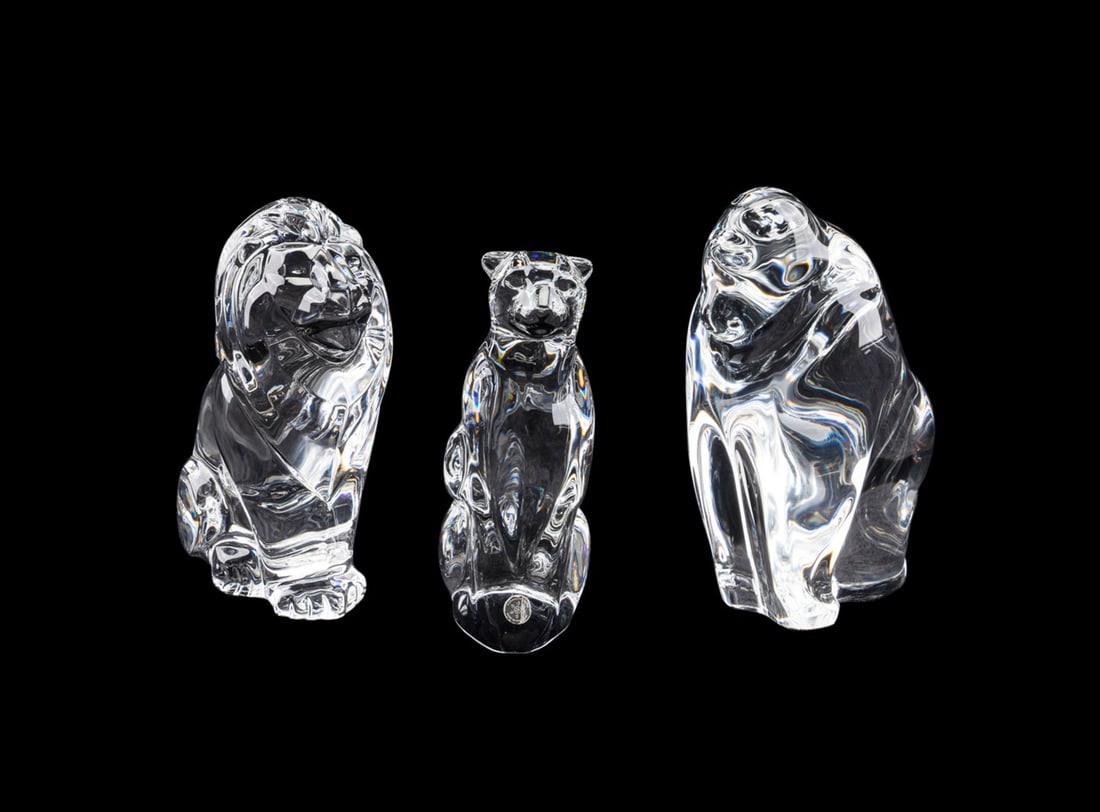 STEUBEN, COLLECTION OF THREE AFRICAN ANIMALS: Steuben (American, founded 1903), late 20th to early 21st century. Collection of three colorless crystal African animal figures comprising, two Taf Lebel Schaefer (American, born 1950) designed animal