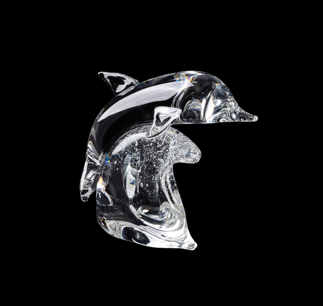 TAF LEBEL SCHAEFER FOR STEUBEN, DOLPHIN FIGURE: Taf Lebel Schaefer (American, born 1950) for Steuben (American, founded 1903), circa 2006. Large colorless crystal figure modeled as a leaping dolphin, appropriately marked. Approximate measurements: