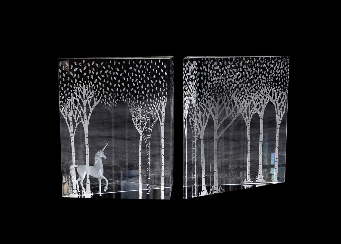 JANE OSBORN SMITH FOR STEUBEN 'ENCHANTED UNICORN': Jane Osborn Smith (English, 1952 - 2013) for Steuben (American, founded 1903), circa 2001. Two-piece "Enchanted Unicorn" colorless crystal sculpture, appropriately marked. Approximate measurements: ov