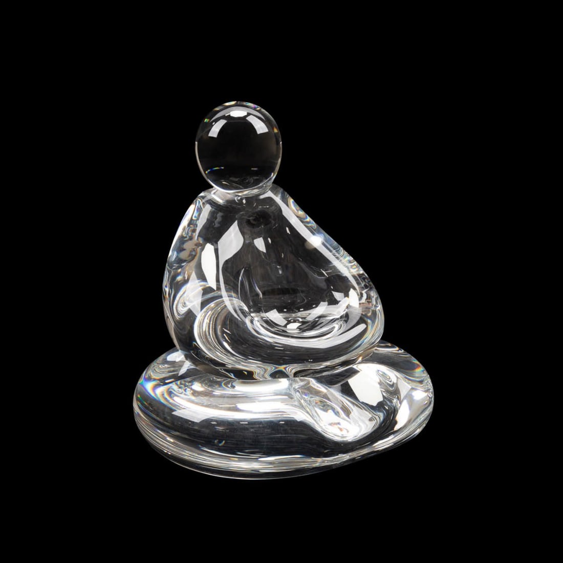 JEFFREY BABCOCK FOR STEUBEN, 'MEDITATION' FIGURE: Jeffrey Babcock (American) for Steuben (American, founded 1903), circa 2005. Modern colorless crystal "Meditation" figure, appropriately marked. Approximate measurements: h. 9", w. 8", d. 7".