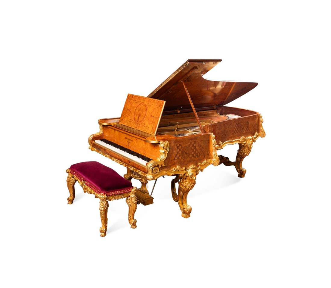 1880 STEINWAY MARQUETRY & GILTWOOD CONCERT GRAND: Steinway and Sons (American, founded 1853), 1880. Rare Rococo style concert grand piano, with marquetry and giltwood decoration, accompanied by a matching bench with a red velvet seat, maker's mark to