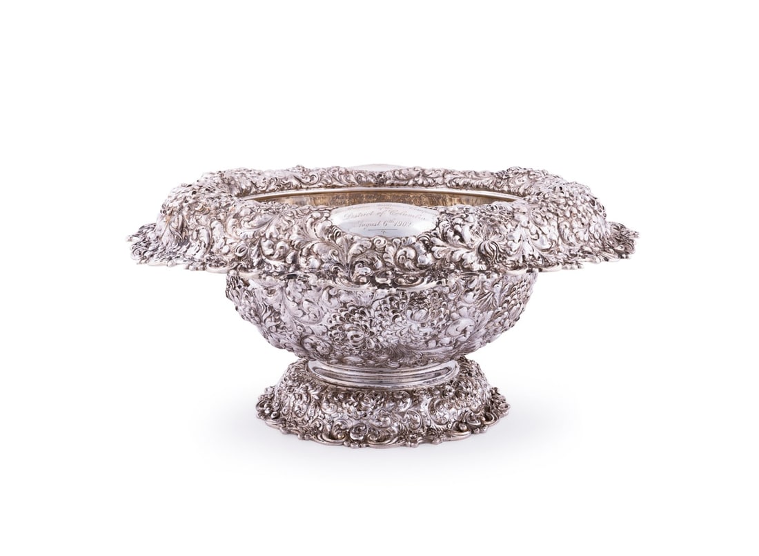 WM. DURGIN REPOUSSE STERLING PUNCH BOWL, C. 1902: William B. Durgin Co. (American, 1853-circa 1940), circa 1902. Floral repousse footed center or punch bowl, having a gold wash interior and multiple inscriptions, "Presented To / John Taylor Arms / By